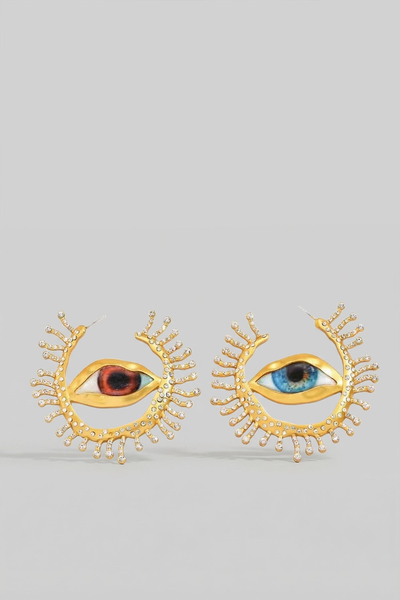 Inés - Pendientes de Ojo Llamativos con Detalles de Rayos de Cristal - Dorado