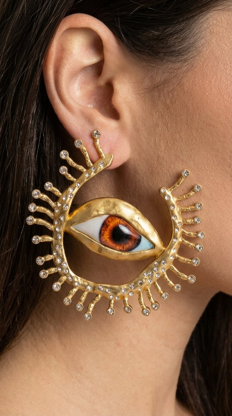 Inés - Pendientes de Ojo Llamativos con Detalles de Rayos de Cristal - Dorado